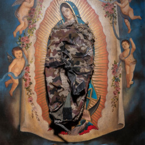A ceramic painting of the Virgin of Guadalupe in a Cemetery in Sonora.