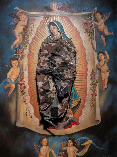 A ceramic painting of the Virgin of Guadalupe in a Cemetery in Sonora.